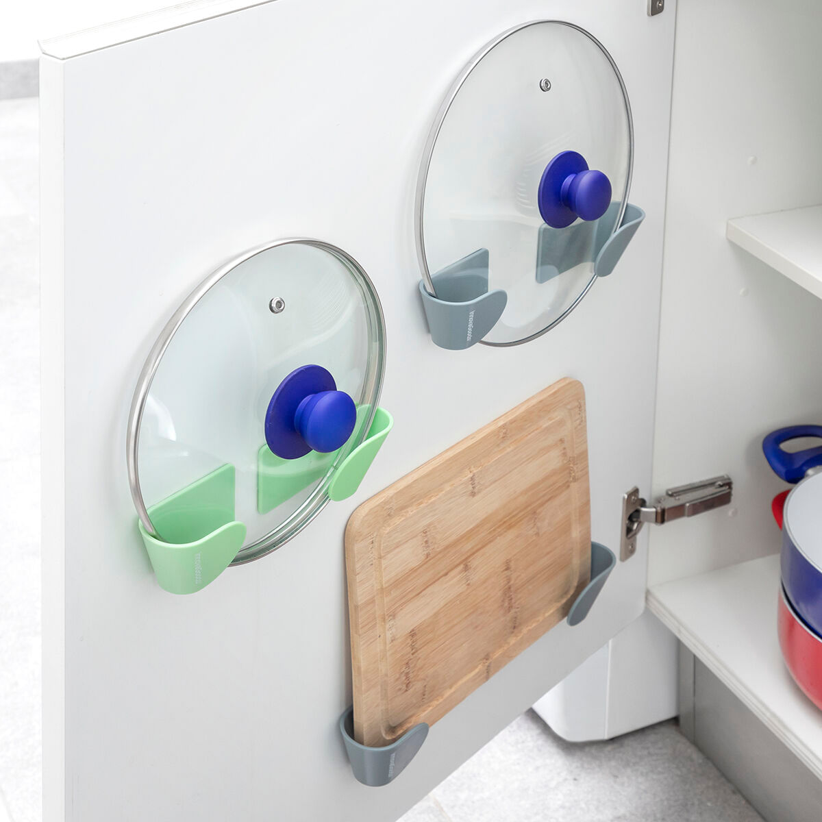 Set de 3 suporturi adezive pentru capace de cratita Smarack InnovaGoods